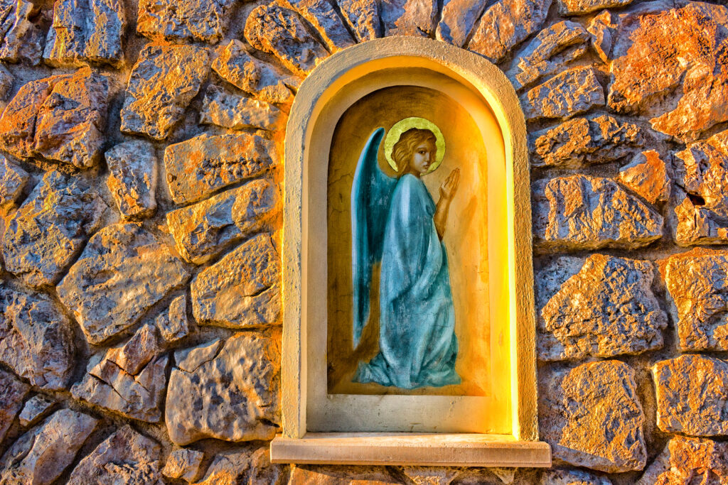 Depositphotos_63945691_XL Aedicula with painted angel in Medjugorje Author VividaPhoto
